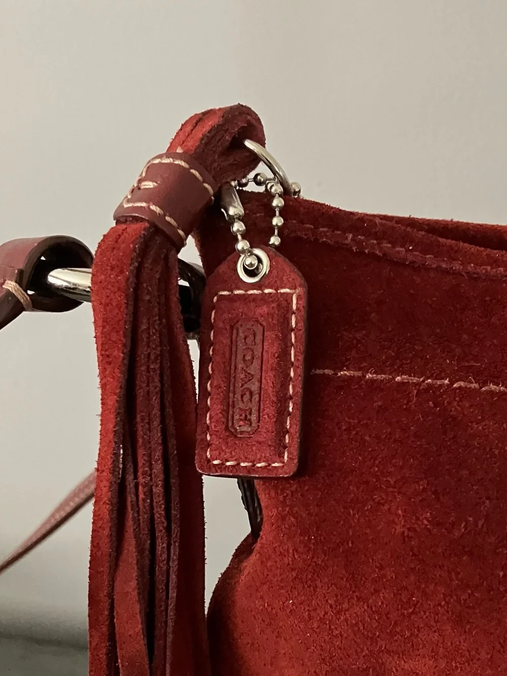 Coach Suede Burgundy SoHo crossbody Bag with Tassel